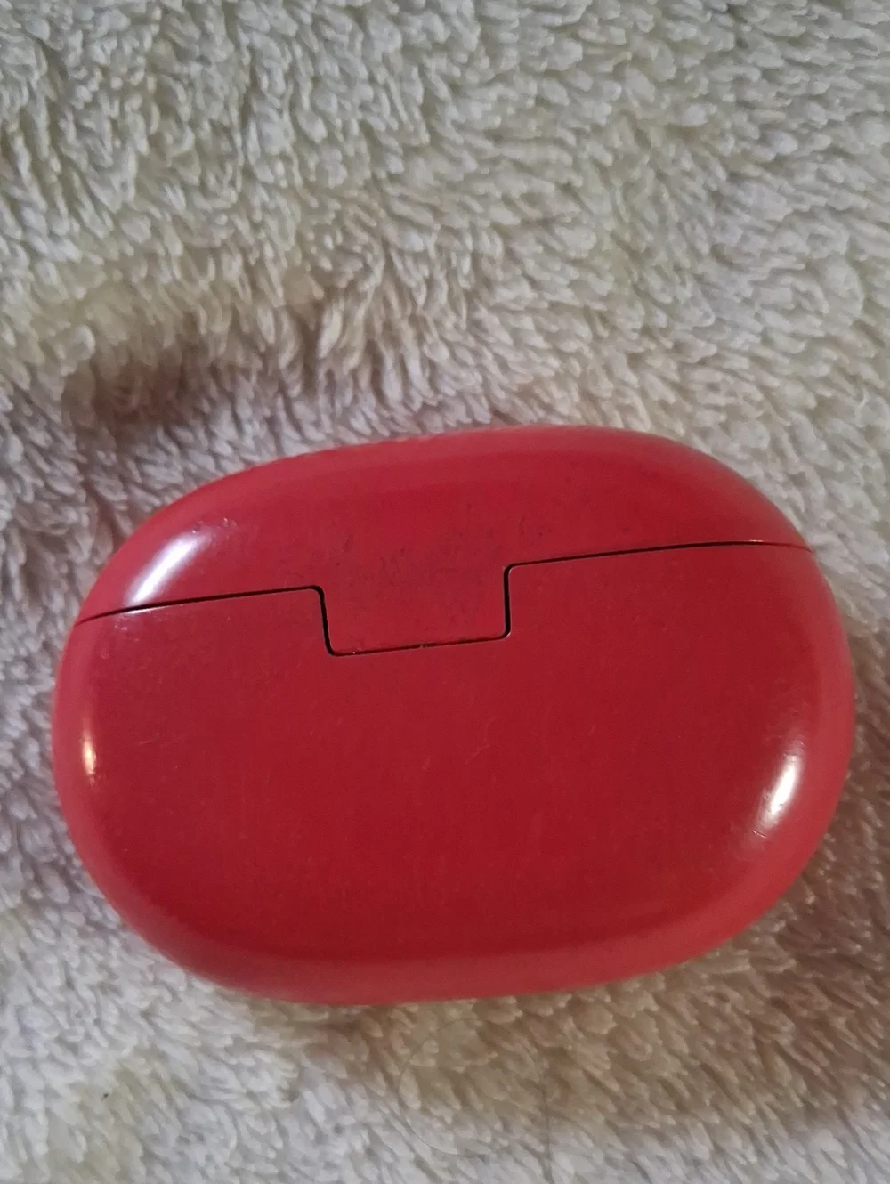 Beats wireless Ear Buds And Red Wireless Earbuds Charging Case